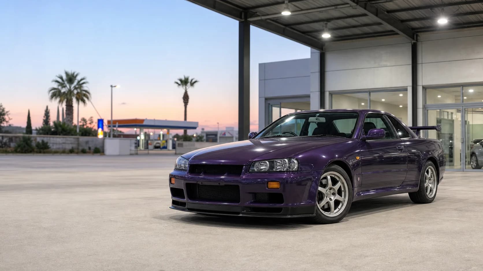 Purple Japanese performance coupe at a modern Cyprus vehicle forecourt